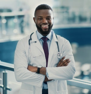 Portrait of handsome smiling african american doctor